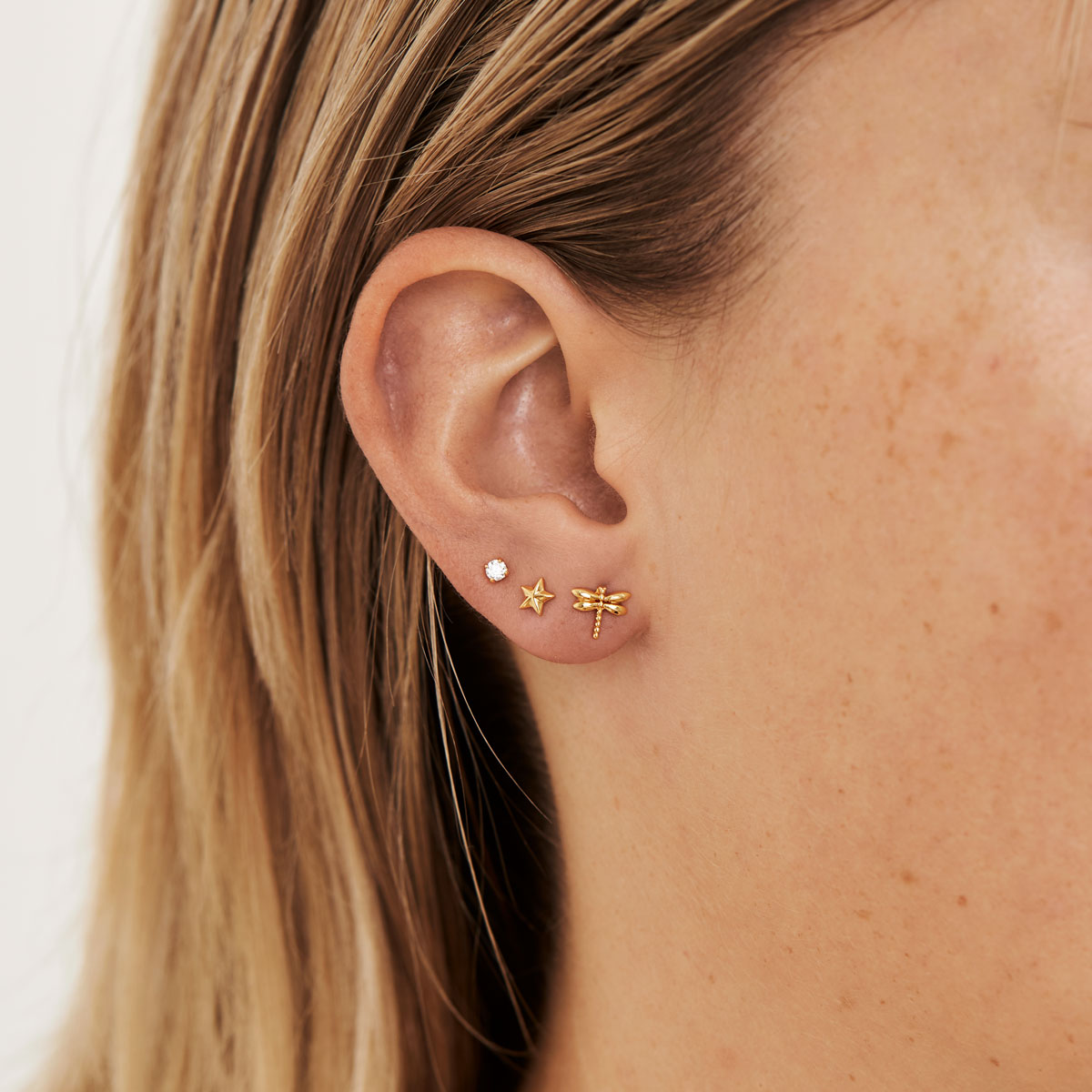 Tiny Star Studs Gold